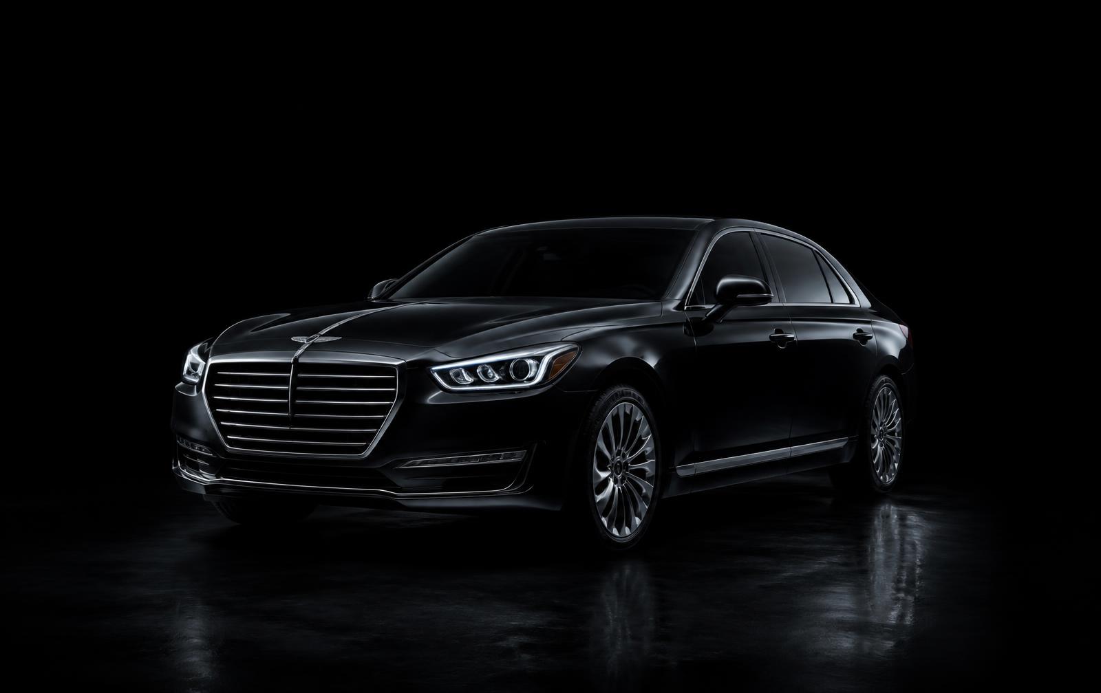 Glossy black luxury sedan photographed in a dark studio, used to explore the areas KingWash details